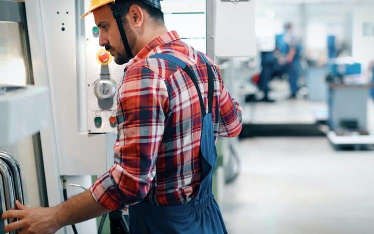 industrial factory employee working in metal manufacturing industry