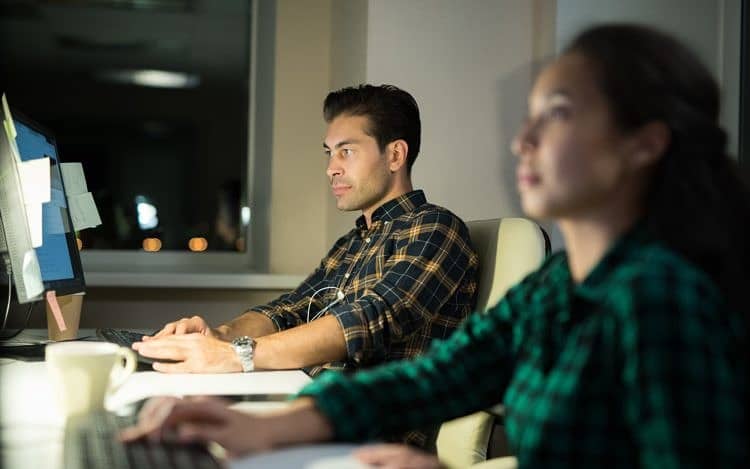 People Using Computers in Office