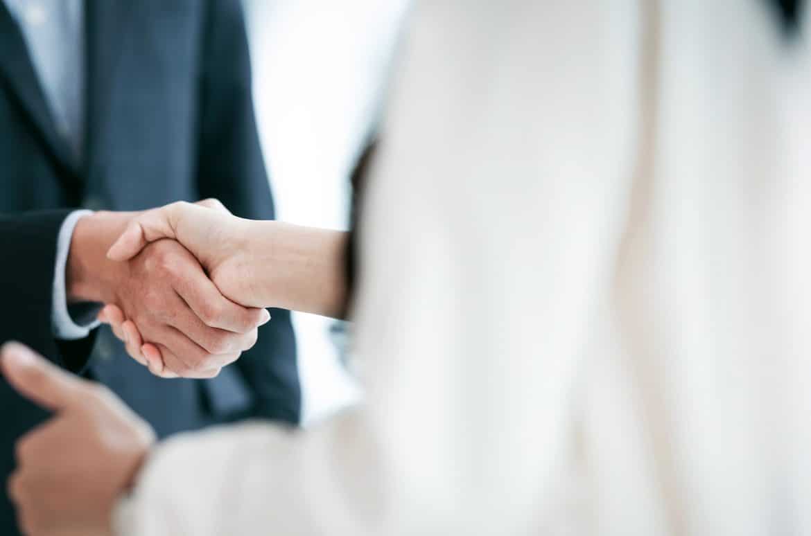 Business people making handshake with partner, greeting, dealing, merger and acquisition