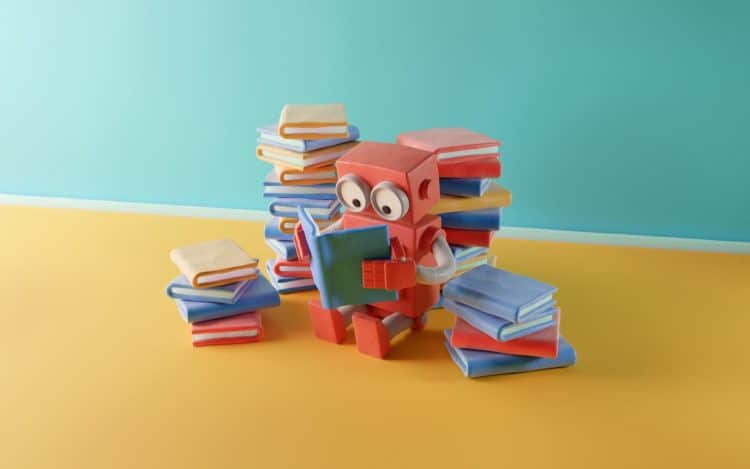 Clay robot reading a book