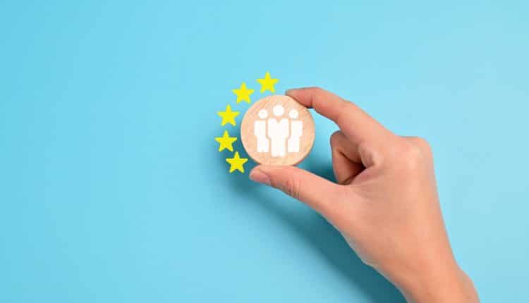 People employees icons on wooden blocks,