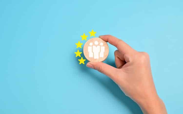 People employees icons on wooden blocks,