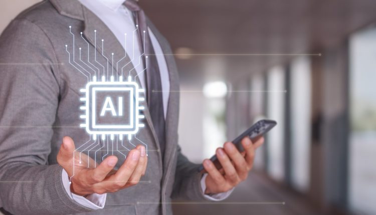 Businessman Holding Smartphone with AI Technology Concept in Modern Office