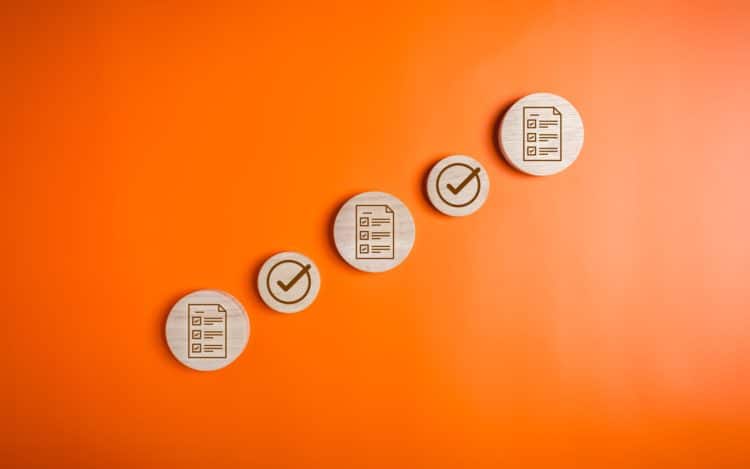 Checklist icons and magnifying glass for digital business document management