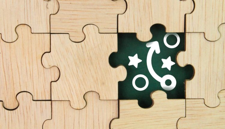 wooden puzzle with Planning, strategy or tactics icons. the concept of business strategy or business